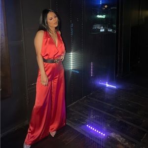 Hot pink/ salmon colored jumpsuit. Worn once. Customized to fit a 5’2 height .